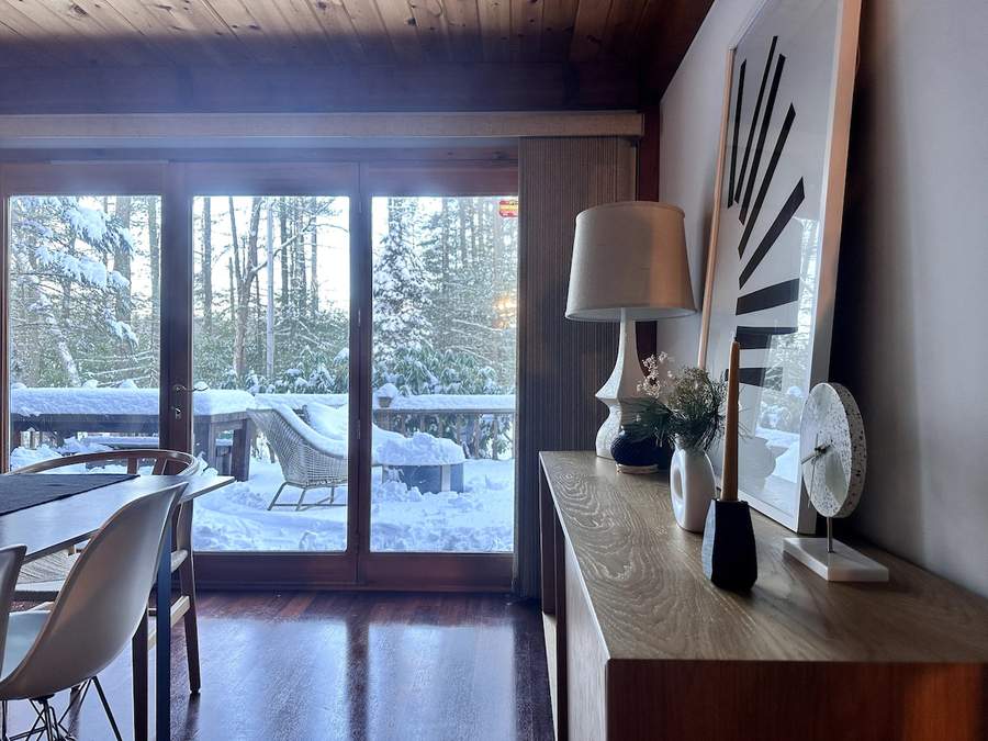 Open kitchen and dining space at Lofty Cabin
