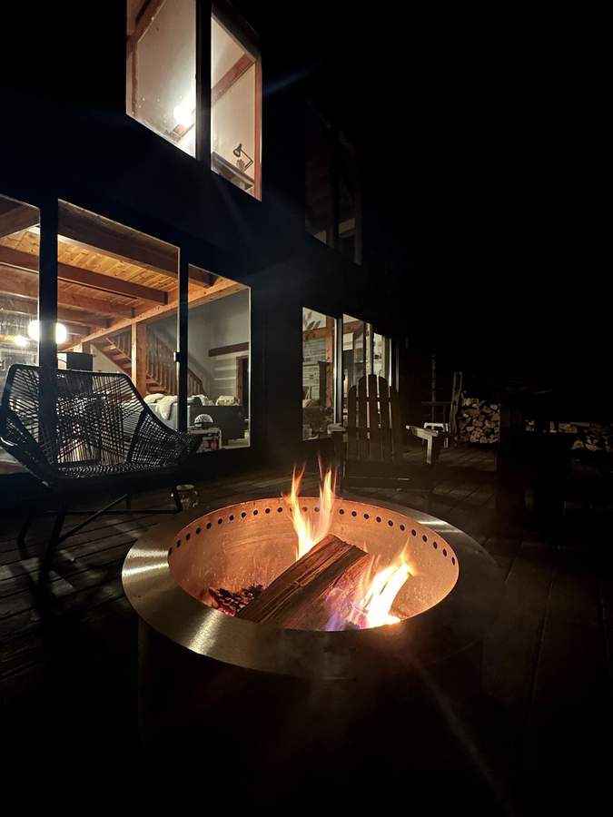 Propane grill and outdoor cooking area at Lofty Cabin